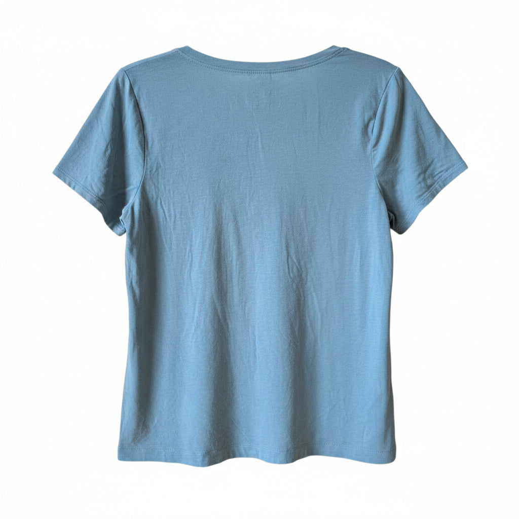 Back view of the solid seafoam green Calvin Klein t-shirt showing the casual fit.