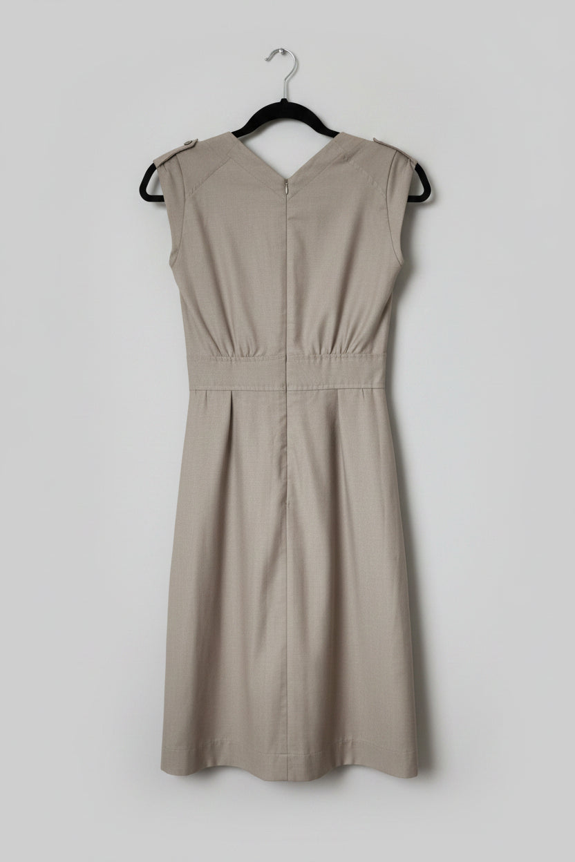 Back view of the khaki tan Allison Wonderland wool blend midi dress on a hanger, showcasing the elegant V-neck back design, tailored waist pleats, and hidden rear zipper closure