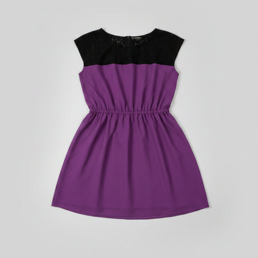Front view of a dark purple Bebop sleeveless mini dress featuring a cinched waist and textured eyelet lace detailing.