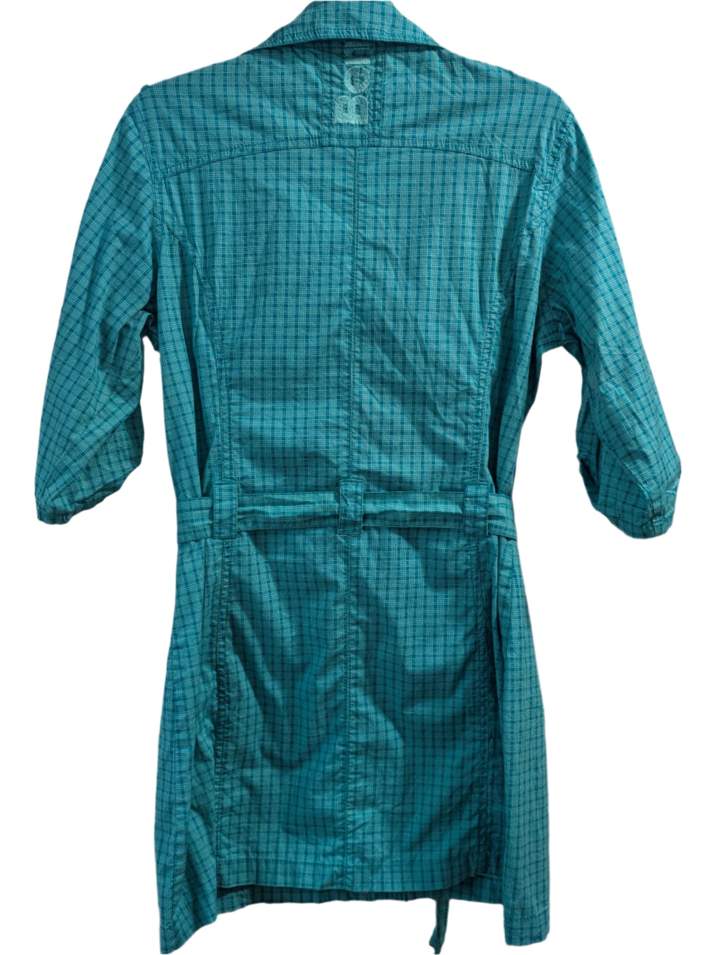 Back view of the long teal cotton Bench jacket, showcasing the adjustable waist tie and flattering longline drape.