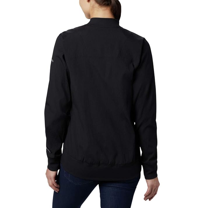 Back view of the black Columbia Bachy Butte long bomber jacket showing the curved high-low hemline.