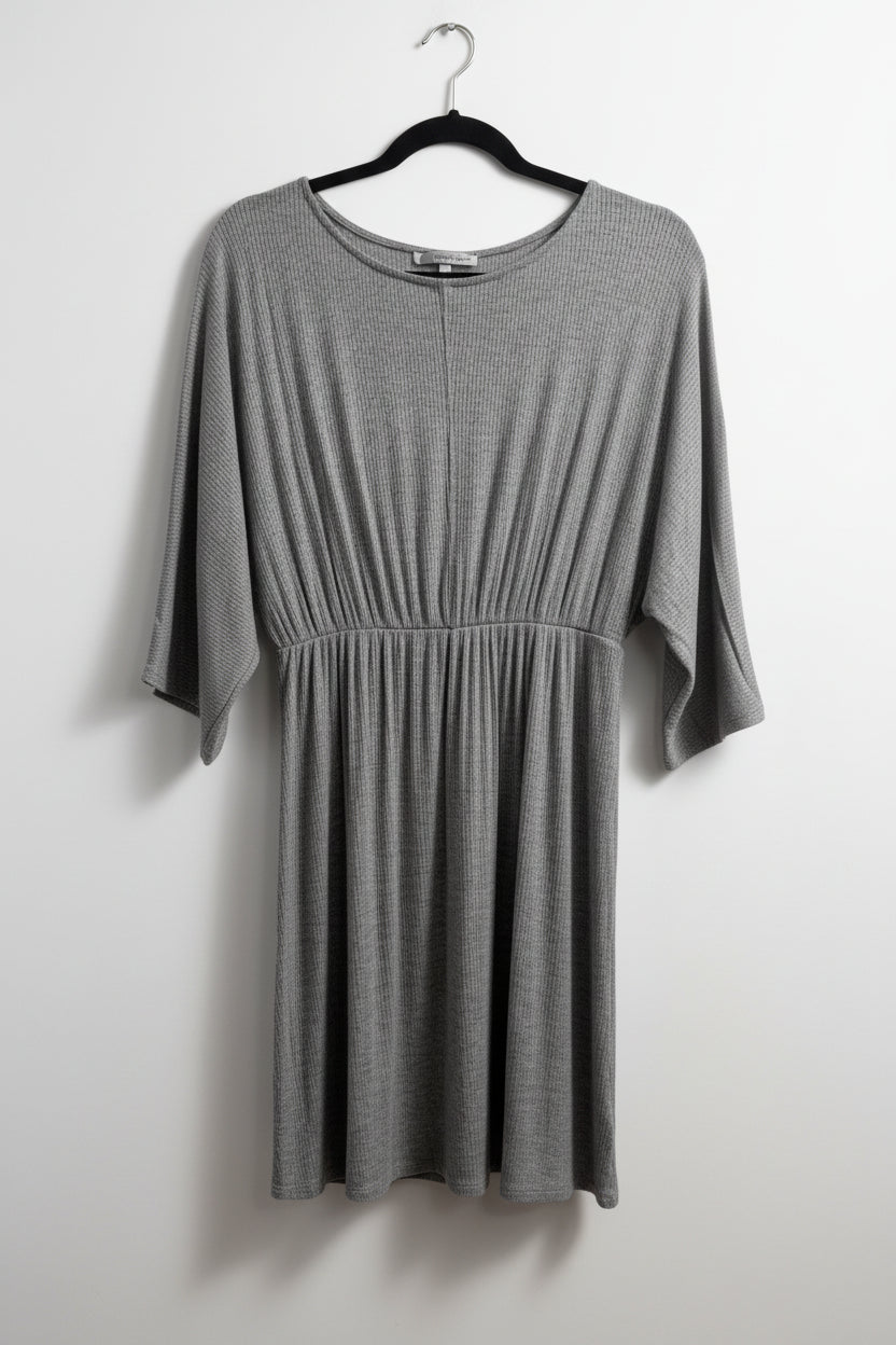 Close-up view of the round neckline and stretchy ribbed rayon fabric texture on the gray Emma's Closet dress.