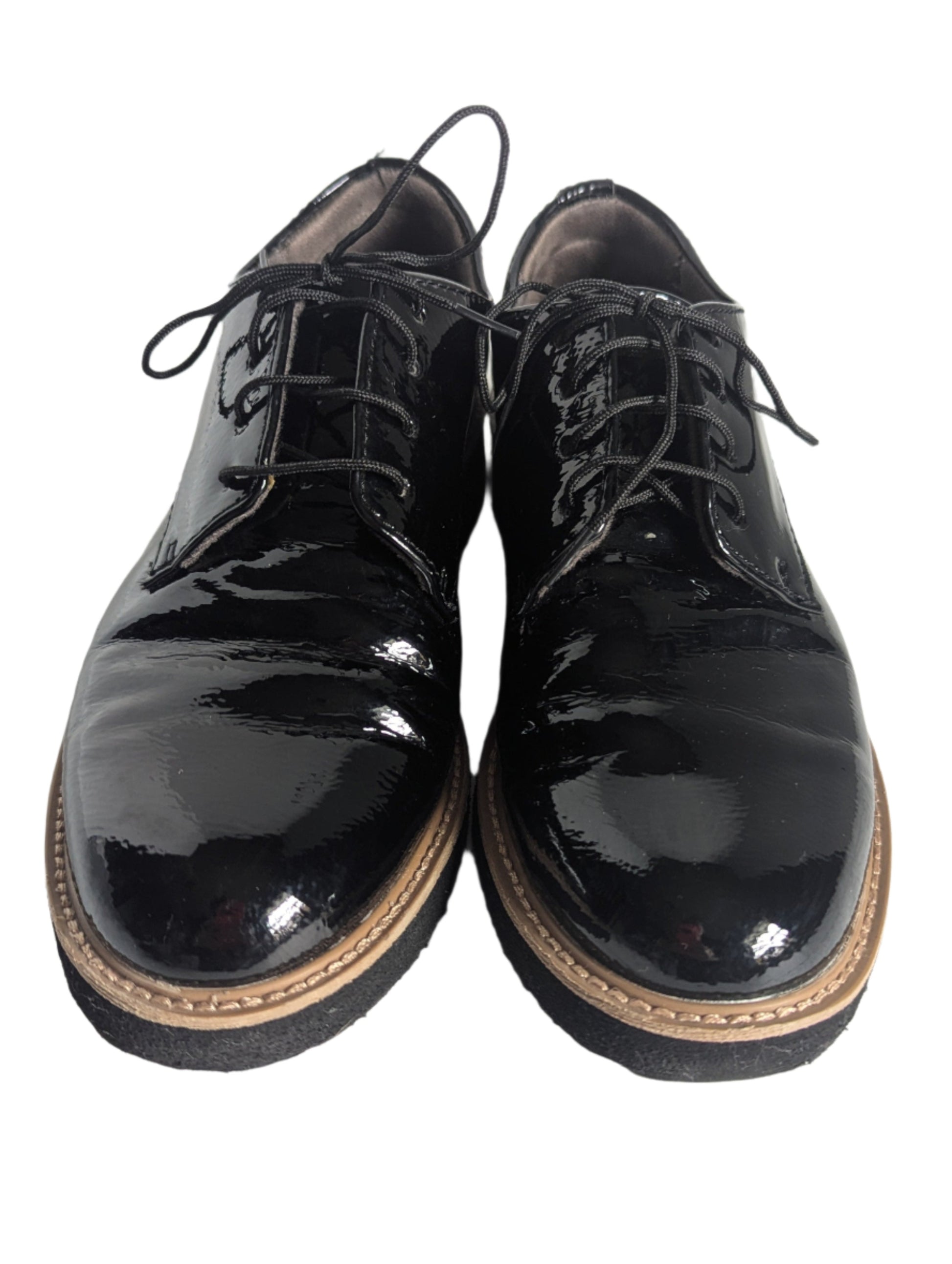 Top-down view of a pair of shiny black EuroSoft patent oxford flats, highlighting the clean round toe design and like-new condition.