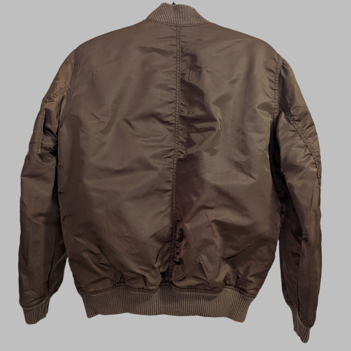 Back view of the padded brown satin Gap bomber jacket highlighting the clean shoulder seams and ribbed waistband.