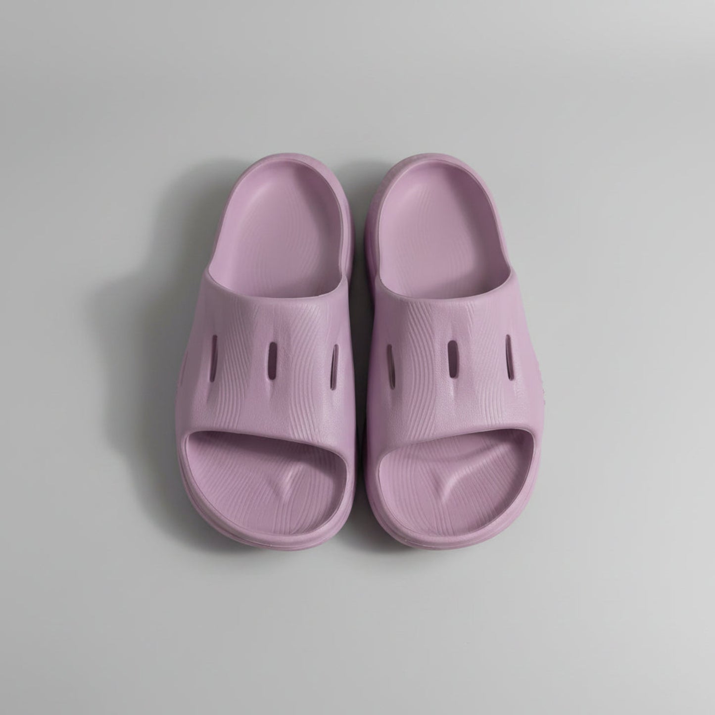 Overhead view of a pair of lavender purple Hoka One One Ora Recovery slide sandals in a women's size 7