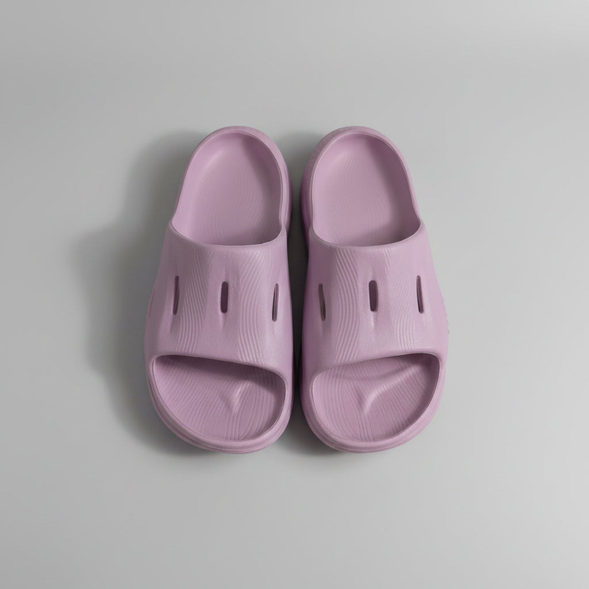 Overhead view of a pair of lavender purple Hoka One One Ora Recovery slide sandals in a women's size 7