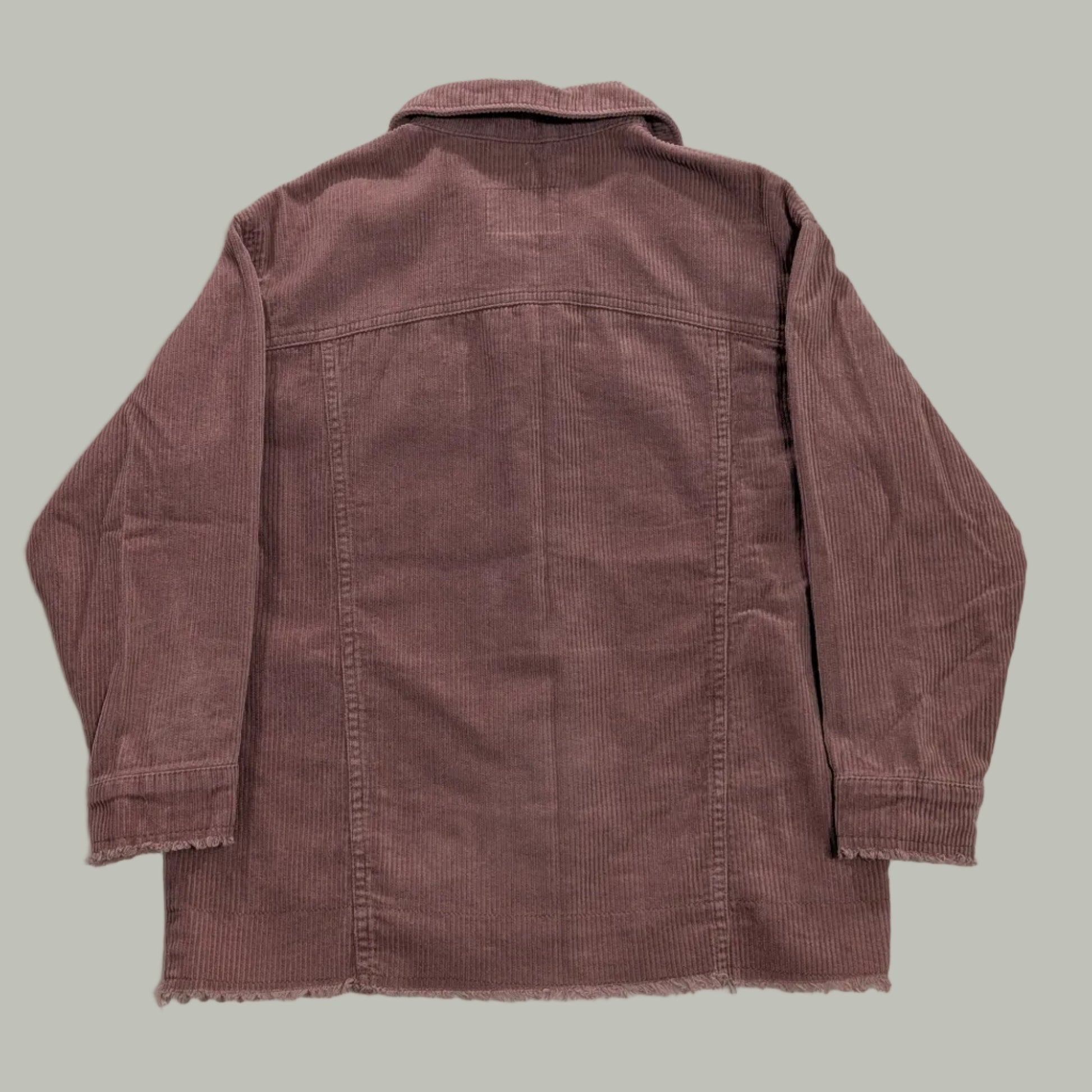 Full back view of the well-loved Zara terracotta corduroy jacket, highlighting its relaxed drop-shoulder cut and casual silhouette.