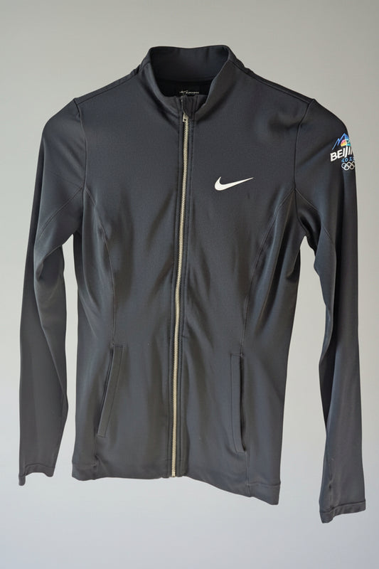 Front view of a black Nike Yoga Dri-Fit full zip athletic jacket