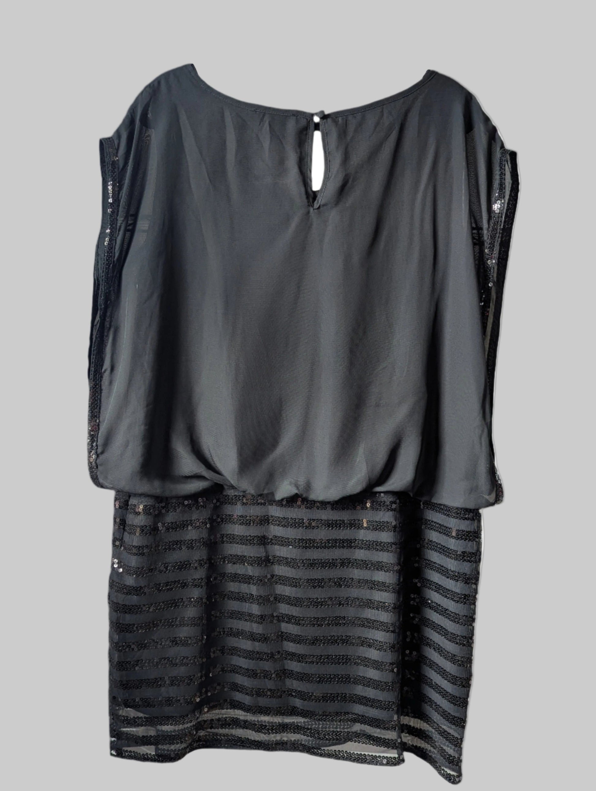 Back view of the black tank-style plus size Tradition cocktail mini dress.