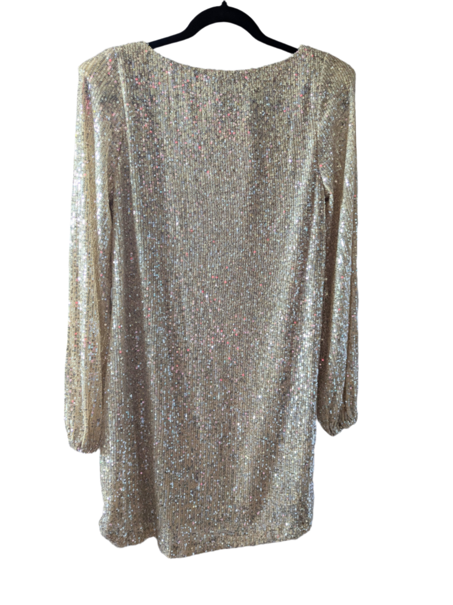 Full-length back view of a long-sleeved, knee-length gold sequin party dress by Betsey Johnson on a black hanger, showcasing the shimmering fabric and cocktail silhouette